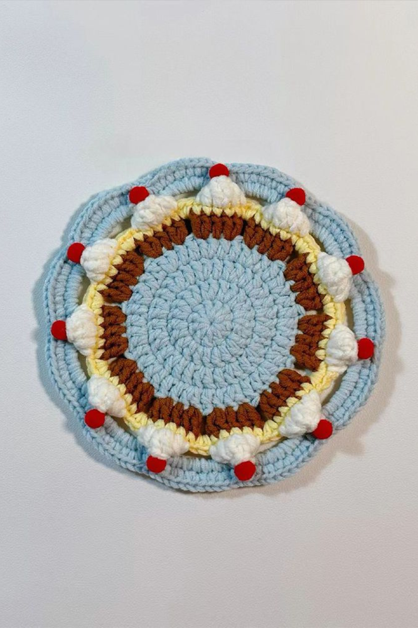 Handmade Finished Hand-crocheted coasters - vibrant red and blue cake color scheme