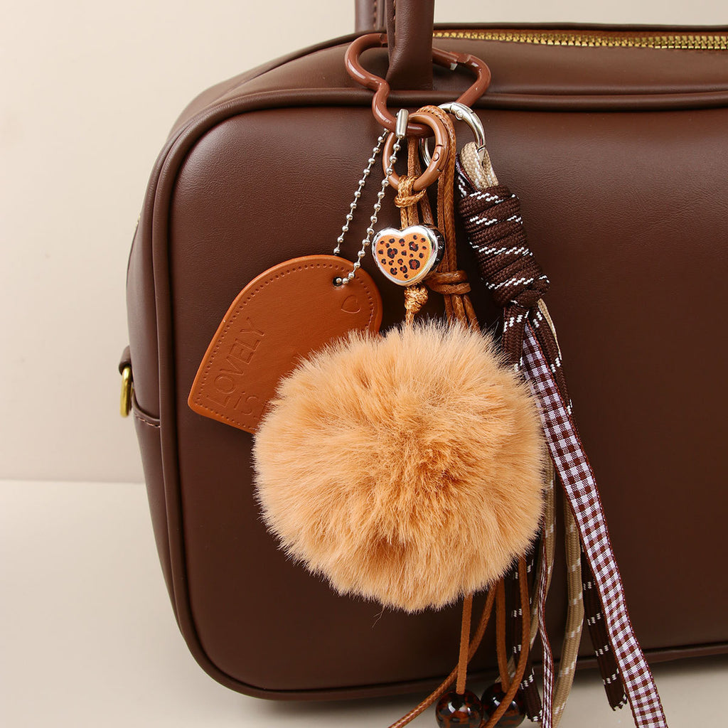 Stylish and cute pom-pom charms - bag decorations and personalized accessories and keychains