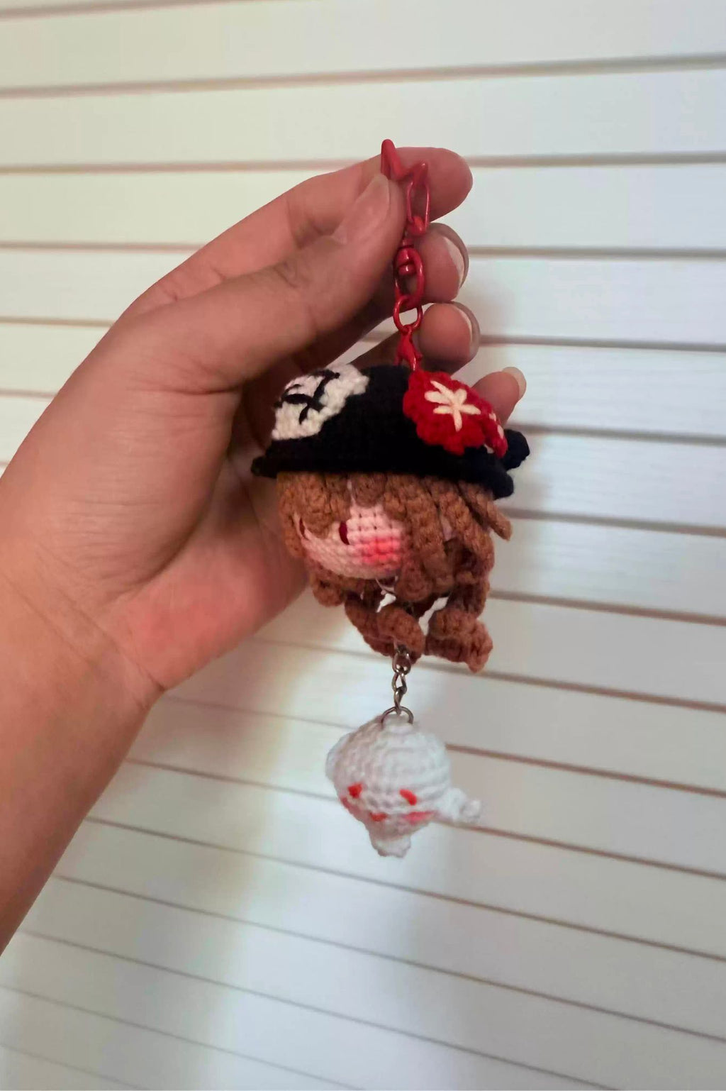 Hu Tao crochet keychain used as bag accessory — cute handmade Genshin Impact doll