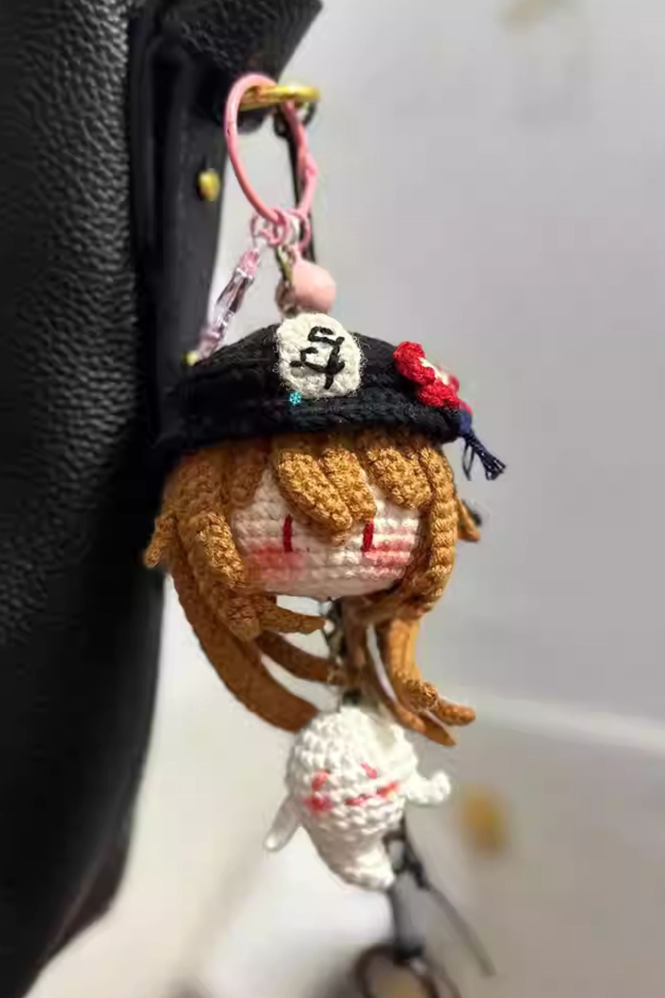 Hu Tao crochet keychain used as bag accessory — cute handmade Genshin Impact doll
