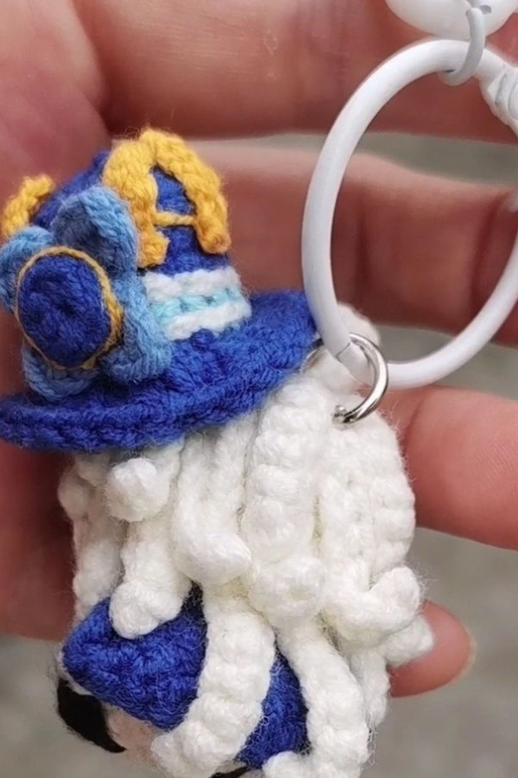 Furina crochet keychain charm used as bag accessory — cute handmade game doll